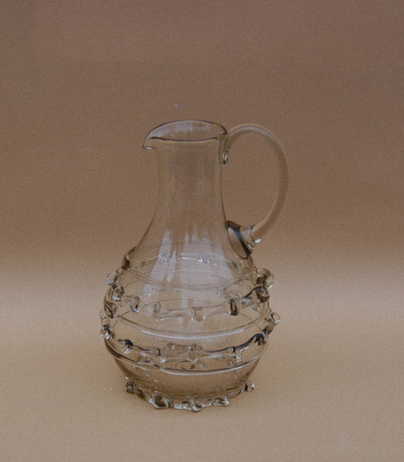 Mouthblown carafe with ornaments